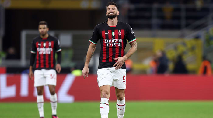 AC Milan striker Olivier Giroud reacts during a loss to Inter Milan.